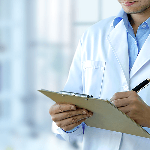 Veterinary professional reviewing product development notes